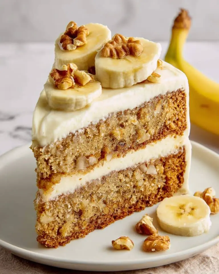 Banana Cake with Cream Cheese Frosting and Walnut Garnish Recipe