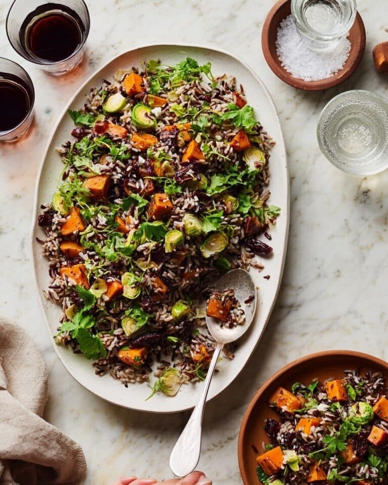 Wild Rice Pilaf with Roasted Sweet Potatoes, Cranberries, and Pecans Recipe