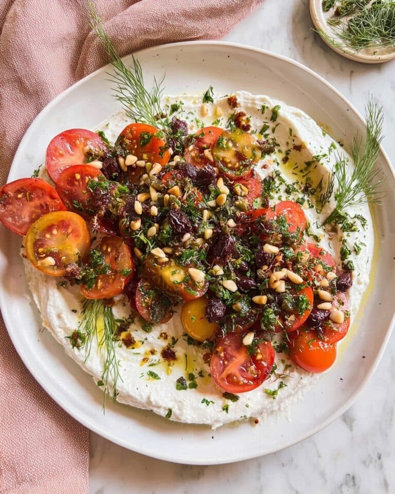 Heirloom Tomato Salad with Whipped Ricotta, Olives, and Pine Nuts Recipe