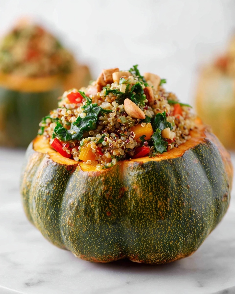The image shows a round, green and orange pumpkin with a rough textured skin, hollowed out and filled with a colorful mixture of quinoa, small diced red and orange vegetables, dark green leafy vegetables, and small pieces of light brown nuts or tofu. The filling is heaped above the pumpkin's edges in a loose, slightly uneven mound. The pumpkin sits on a smooth white marbled surface with a soft blurred background showing another similar filled pumpkin. Photo taken with an iphone --ar 4:5 --v 7