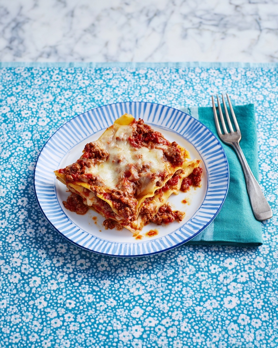 A close-up of a thick slice of lasagna on a white plate with purple and green floral patterns, showing three layers: a bottom layer of creamy white ricotta cheese mixed with herbs, a middle layer of rich red meat sauce with chunky texture, and a top layer covered with melted golden-brown cheese sprinkled with fresh green herbs. The background is a blurred wooden surface with a white marbled texture visible under the plate. Photo taken with an iphone --ar 4:5 --v 7