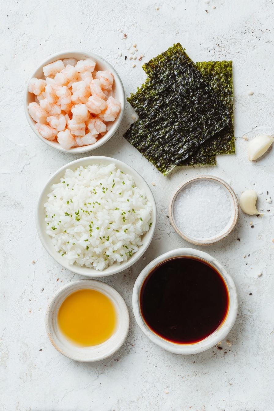 Flat lay of a small mound of shiny cooked sushi rice sprinkled with black and white sesame seeds and bits of green seaweed furikake, a white ceramic bowl filled with bite-sized raw chicken drumstick meat pieces marinated in a pale soy and sake mixture, a small white ceramic bowl containing dark glossy teriyaki sauce with a rich brown sugar sheen, a bunch of fresh minced garlic cloves arranged neatly beside a small pool of golden cooking oil in a white ceramic bowl, a single sheet of deep green shiny nori cut into small rectangles, a small white bowl holding fine white salt granules, all elements arranged symmetrically and balanced with realistic proportions, placed on a clean white marble surface, soft natural light, photo taken with an iPhone, professional food photography style, fresh ingredients, white ceramic bowls, no bottles, no duplicates, no utensils, no packaging --ar 2:3 --v 7 --p m7354615311229779997 - Chicken Teriyaki Onigiri, Japanese rice balls with teriyaki chicken, homemade onigiri recipes, easy Japanese rice snack, savory chicken onigiri