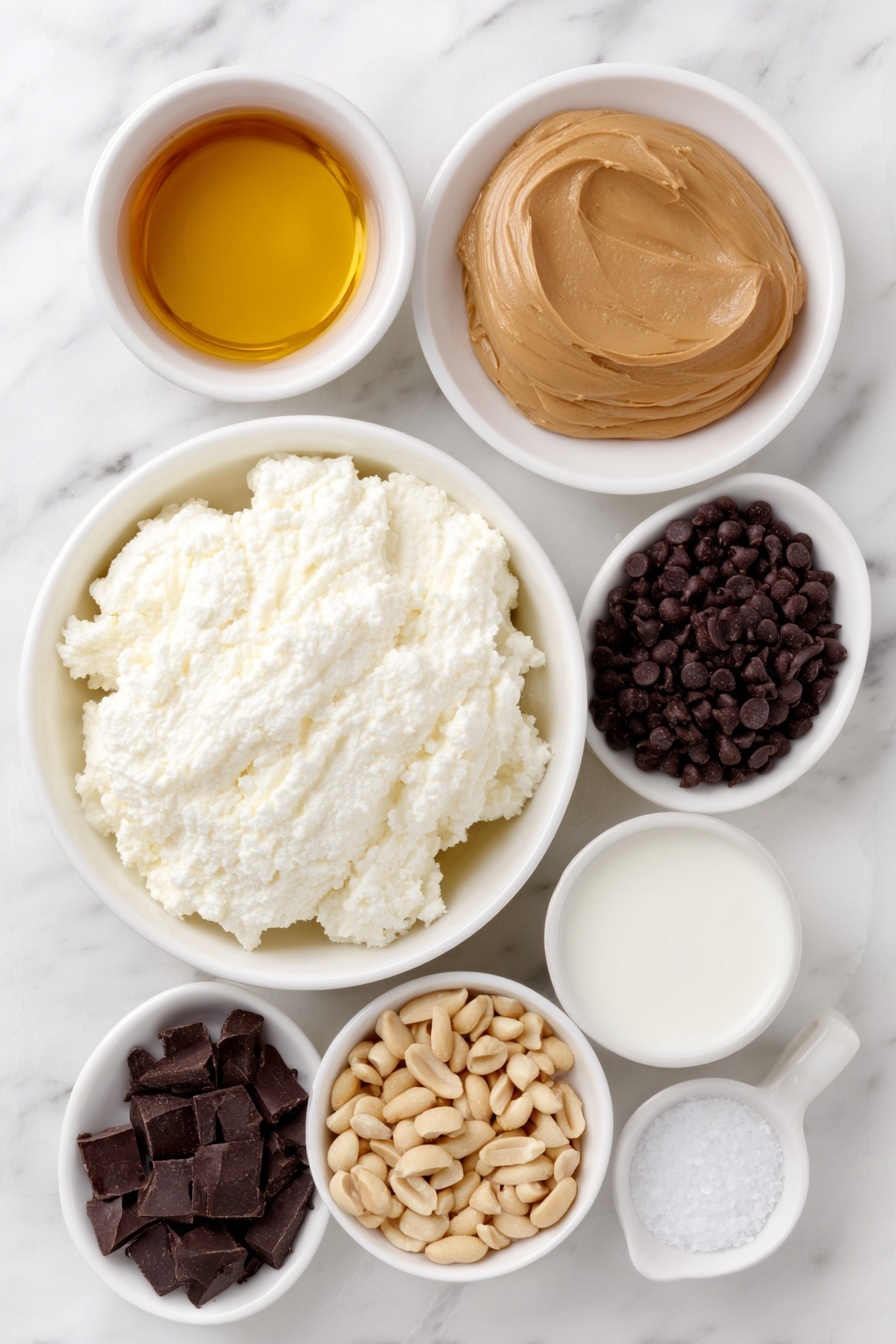 Flat lay of fresh full-fat cottage cheese scooped into a small white ceramic bowl, a smooth dollop of natural creamy peanut butter on a white plate, a small white bowl filled with golden maple syrup, a small white bowl with clear vanilla extract, a pinch of coarse salt crystals scattered neatly on the surface, a small white bowl of fresh milk, a small white bowl holding glossy dark chocolate chips, a tiny white bowl with liquid coconut oil, and a small pile of chopped raw peanuts arranged artfully around the bowls, placed on a clean white marble surface, soft natural light, photo taken with an iPhone, professional food photography style, fresh ingredients, white ceramic bowls, no bottles, no duplicates, no utensils, no packaging --ar 2:3 --v 7 --p m7354615311229779997 - Peanut Butter Cottage Cheese Mousse, healthy mousse with peanut butter and cottage cheese, protein-packed dessert recipes, quick healthy mousses, easy cottage cheese desserts